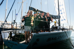 Smuggler crew with the Peter Rysdyk trophy for the overall winner    Image: CYCA | Ashley Dart