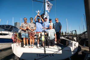 The crew of Bacchanal celebrate with their trophies.    Image: CYCA | Ashley Dart