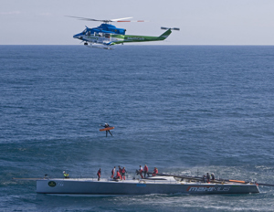 Injured crew on Maximus being transferred to a helicopter