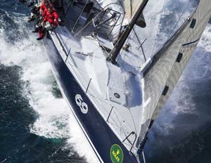 Rob Hanna and his crew aboard Shogun, surfing their way through waves on the way to Hobart