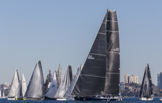Race start postponed until breeze fills in on Sydney harbour - now starting at 1:50pm