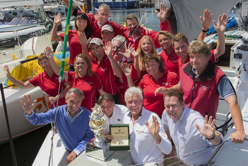 Roger Hickman, Owner Wild Rose, and crew receive the Tattersall's Cup and a Rolex Timepiece.
Front row: Jean-Nöel Bioul, Rolex SA, John Cameron, Commodore Cruising Yacht Club of Australia, Roger Hickman, Richard Batt,  Commodore Royal Yacht Club of Tasmania.