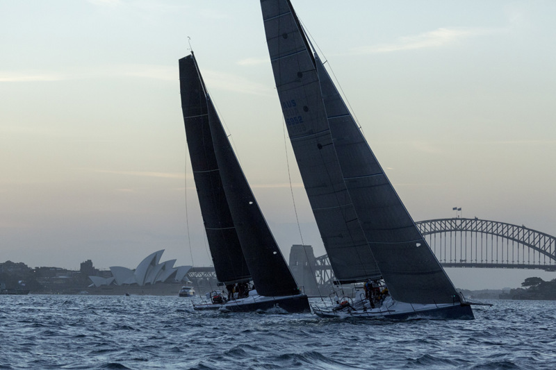 Sam Haynes' TP52 Celestial leads Jason Ward's Mills 45 Concubine at the twilight start of the 2017 Newcastle Bass Island Race. 
