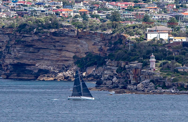 URM passing the Hornby Light on South Head. 