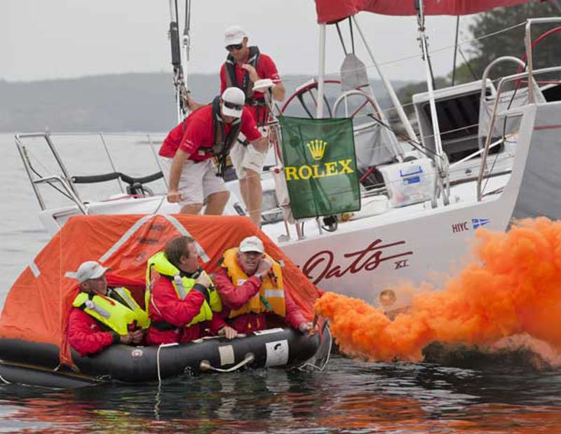 Wild Oats XI crew members in a lifecraft during their safety exercise
